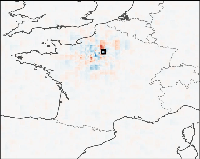 BaseGrad attribution map over France: sparse, speckled red and blue pixels with no coherent structure.